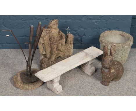 A quantity of stone garden ornaments. Including miniature bench, rabbit, etc.  