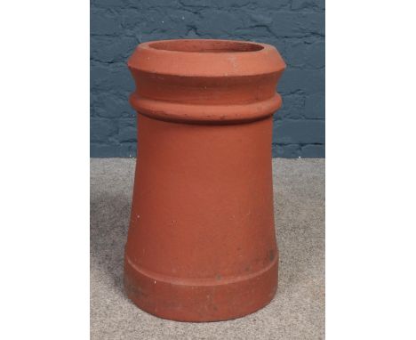 A terracotta chimney pot/garden planter. (Height 47cm).  