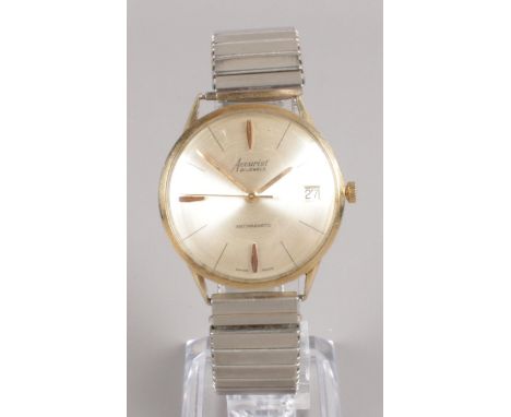 A 9 carat gold cased Accurist 21 jewel gents automatic wristwatch, with stainless steel expanding wrist strap.  Working