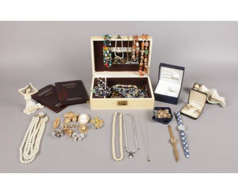 A selection of mostly costume jewellery - comprising of a jewellery box with a selection of necklaces, brooches, earrings and