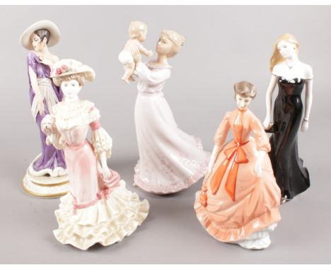 A quantity of ceramic figures formed as ladies. Including Royal Worchester examples, etc.  