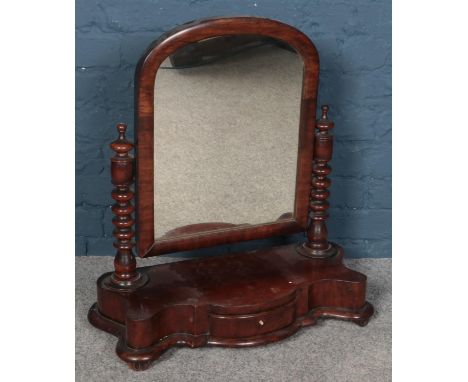 A carved mahogany toilet mirror with drawer base.  Some woodworm. Knocks to wood. Frame loose along bottom edge. Age wear. Ba