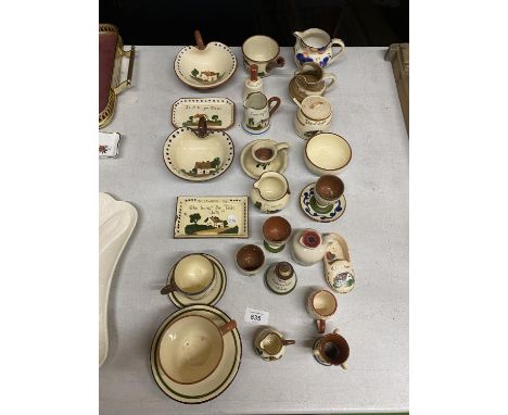 A QUANTITY OF MOTTO WARE TO INCLUDE, CUPS, JUGS, EGG CUPS, ETC 