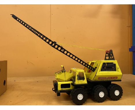A LARGE TIN PLATE VINTAGE CRANE 
