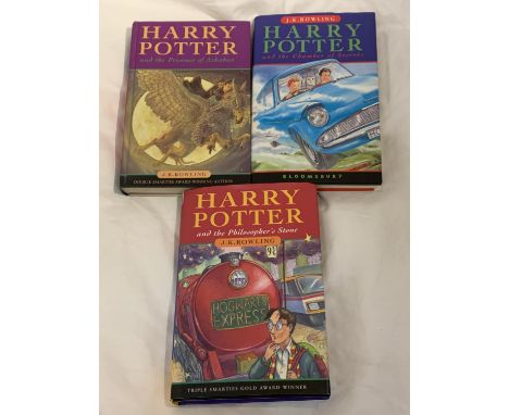 THREE HARRY POTTER FIRST EDITION HARDBACKS BY J.K. ROWLING. THE PHILOSPHER'S STONE PUBLISHED 1997 (PRINT 28-30) CHAMBER OF SE