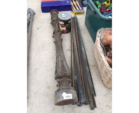 A CAST IRON PILLAR AND AN ASSORTMENT OF METAL STAIR RODS 
