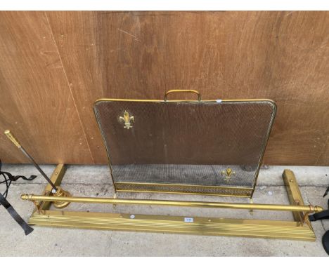 A BRASS FIRE FENDER, A BRASS FIRE SCREEN AND A FURTHER BRASS FIRE POKER WITH STAND 