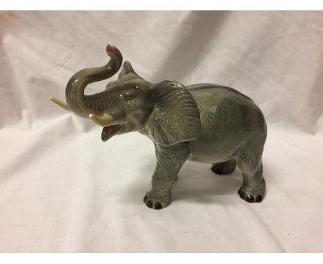 A CERAMIC ELEPHANT 