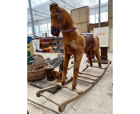 A VINTAGE CHILDRENS ROCKING HORSE 