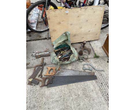 A PASTING TABLE, 2 SAWS AND A QUANTITY OF VARIOUS TOOLS 