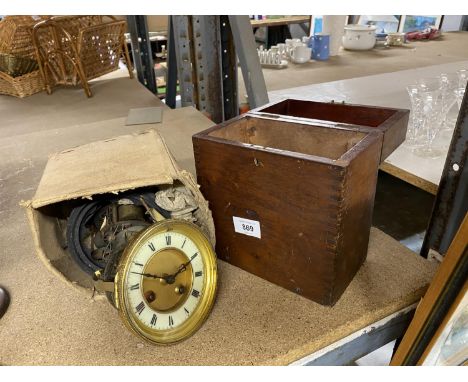 A CLOCK FACE AND WORKINGS IN NEED OF REPAIR, A CORNER WALL SHELF WITH A LION AND A MAHOGANY WOODEN BOX WITH LOCK AND KEY 