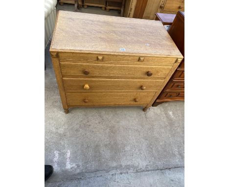 AN EARLY 20TH CENTURY LIGHT OAK CHEST OF THREE DRAWERS, 34.5" WIDE 