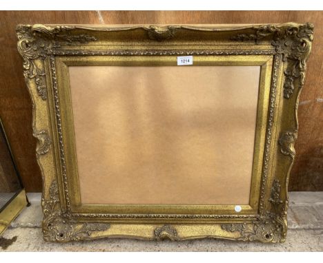 A LARGE VINTAGE GILT PICTURE FRAME 