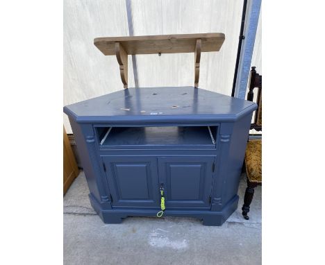 A PAINTED CORNER MEDIA UNIT AND PINE SHELF 