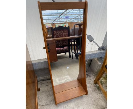 A RETRO TEAK WALL MIRROR ENCLOSING SMALL SHELF, 42 X 16" 