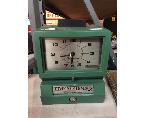 A VINTAGE TIME SYSTEMS CLOCKING IN CLOCK 
