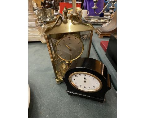 TWO MANTEL CLOCKS, ONE BEING A CARRIAGE CLOCK, THE OTHER SMALL BLACK ONE A/F 