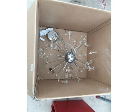 A DECORATIVE MODERN LIGHT FITTING 