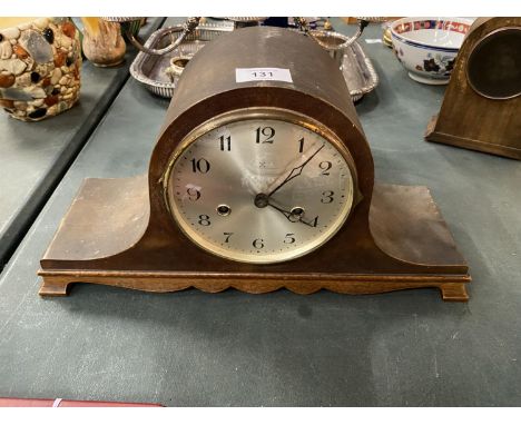 A NAPOLEONS HAT MAHOGANY CASED MANTLE CLOCK- WORKING AT LOTTING UP 