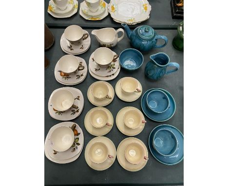 A QUANTITY  OF TEAWARE TO INCLUDE, MIDWINTER, STAFFORDSHIRE TRIOS AND CREAM JUG ROYAL WINTON CUPS AND SAUCERS AND LAMORNA TUR