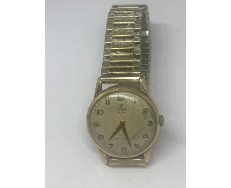 A VINTAGE TUDOR ROYAL BY ROLEX WRISTWATCH WITH A 9 CARAT GOLD CASE AND YELLOW METAL STRAP 