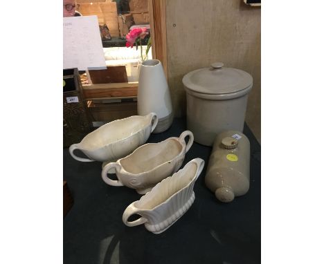 A VINTAGE STONEWARE BREAD CROCK AND HOT WATER BOTTLE, PLUS THREE PLANTERS AND A VASE 