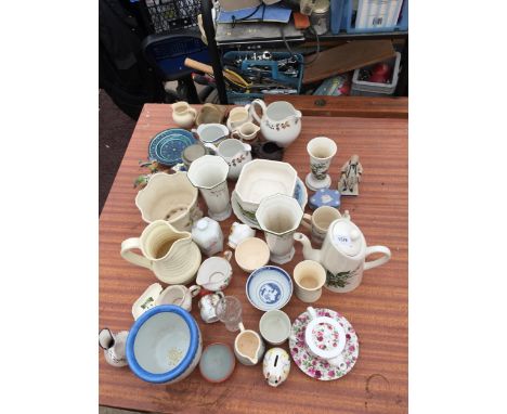 A LARGE ASSORTMENT OF CERAMIC ITEMS TO INCLUDE VASES, JUGS AND COFFEE POTS ETC 