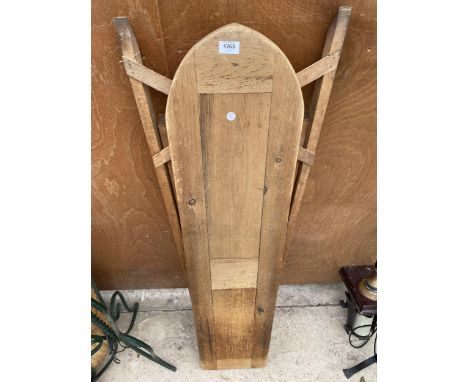 A VINTAGE WOODEN FOLDING IRONING BOARD 