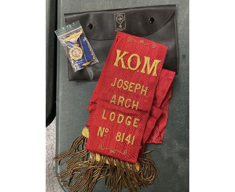 A MASONIC SASH, POUCH AND MEDAL 