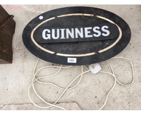 A VINTAGE ILLUMINATED GUINNESS SIGN 