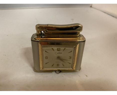 A COLIBRI CLOCK INCORPORATING A TABLE LIGHTER 