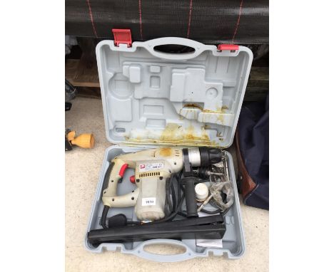 A PERFORMANCE ELECTRIC SDS DRILL 