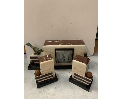 A MARBLE ART DECO MANTLE CLOCK WITH BIRD DECORATION AND GARNITURES 