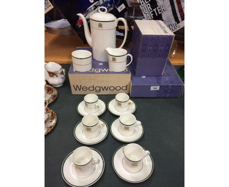 A WEDGWOOD HOUSES OF PARLIAMENT COFFEE SET TO INCLUDE 6 CUPS- 1A/F, 6 SAUCERS, A COFFEE POT, CREAM JUG AND SUGAR BOWL 