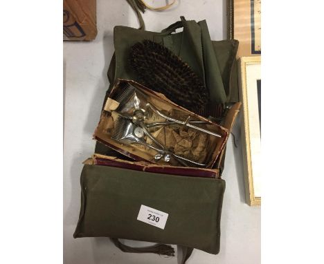 A VINTAGE BOXED HAIR CLIPPERS SET IN A CANVAS CASE 