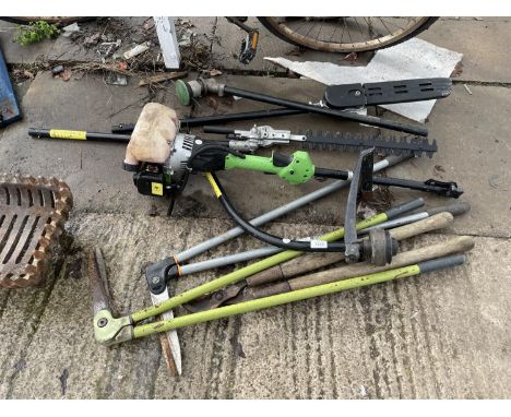 AN ASSORTMENT OF TOOLS TO INCLUDE A PETROL MULTITOOL STRIMMER AND SHEARS ETC 