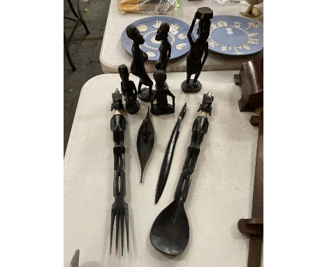 A QUANTITY OF AFRICAN THEMED WOODEN-POSSIBLY EBONY- FIGURES TO INCLUDE, MEN, WOMEN , FORK, SPOON, ETC 