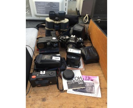 AN ASSORTMENT OF CAMERA EQUIPMENT TO INCLUDE A RICOH KR-10, A POLASONIC AUTOFOCUS 5000 POLAROID CAMERA ETC 