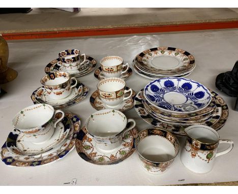 A QUANTITY OF CHINA CUPS, SAUCERS, PLATES, CREAM JUG, SUGAR BOWL, ETC 