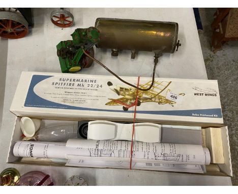 A STATIONARY TWIN CYLINDER STEAM ENGINE AND ATTACHED PRESSURE CYLINDER PLUS A SUPERMARINE SPITFIRE MK 22/24 BALSA WOOD KIT 