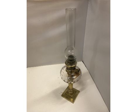 A GLASS AND BRASS VICTORIAN OIL LAMP HEIGHT 56CM 