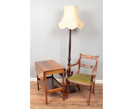 Two pieces of furniture and a standard lamp. Includes a walnut tea trolley with castors and a Sheraton style chair by Mines o