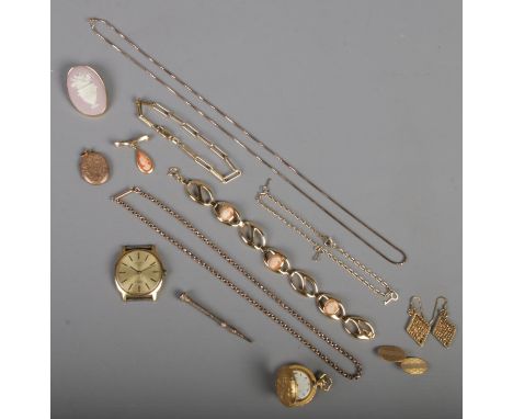 A quantity of yellow metal jewellery. Includes 12ct front &amp; back cuff link, locket, chains, bracelets, Rotary watch head,