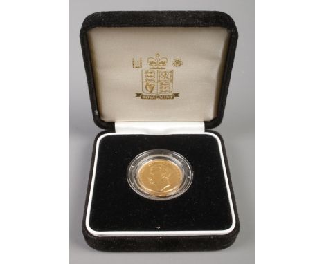 A George IV full sovereign, dated 1827. Bare head portrait with crowned shield to reverse.  