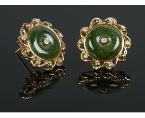 A pair of 18ct Gold, Jade and Diamond ear studs. Total weight: 5.7g  