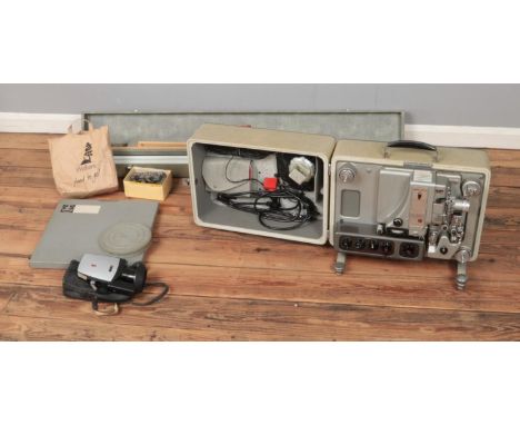 A Bolex S321 sound projector along with an assortment of accessories including projector screen, bulbs, Bauer C5 XL Mokro, et