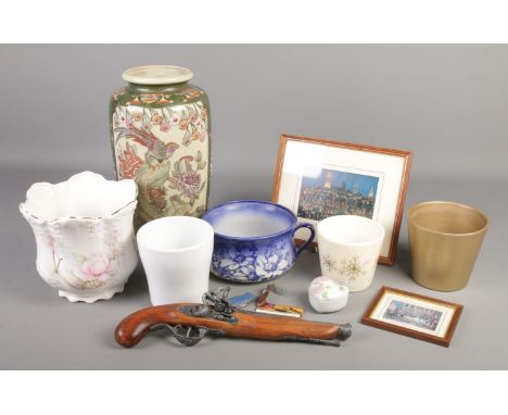 A box of miscellaneous. Includes large oriental vase, ceramic planters, replica flint lock pistol, Cunard tag, pen knife and 