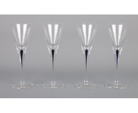 Orrefors - A set of four Intermezzo liqueur glasses, with blue stem. 15cm tall.  