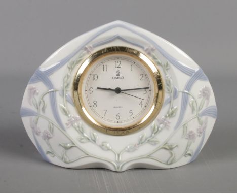 A quartz Lladro mantle clock.  