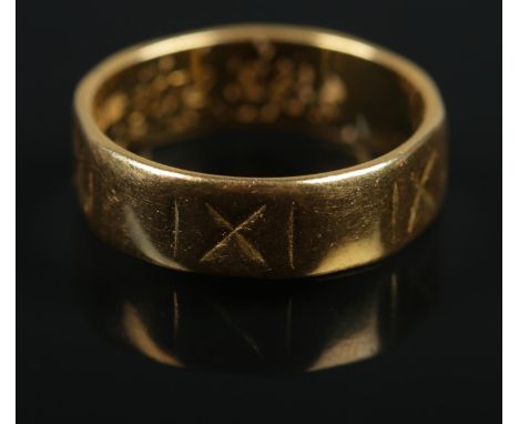 A 22ct gold wedding band. Size K, 4.38g.  